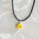 Pendentif oeil Turc jaune 1 cm avec cordon noir